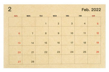 February 2022 brown calendar made from recycled paper isolated on white background.