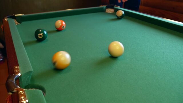 American pool.
Blow with yellow ninth ball in the center pocket. Player missed due to inaccurate game.
