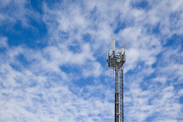 Fototapeta na wymiar Telecommunication tower Antenna against blue sky . Copy space