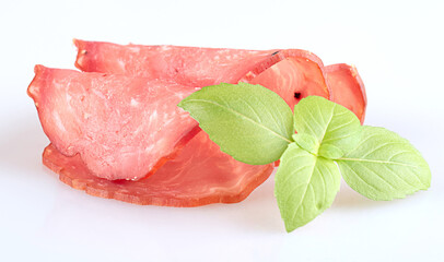 A few pieces of beautiful sausage isolated on a white background