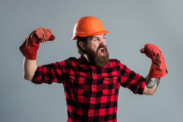 Confident in his new business. builder guy with working tool. brutal hipster wear checkered shirt