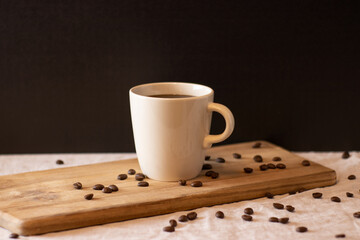 Filter coffee on wood standing and coffee beans. Isolated background