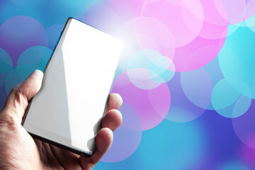 Phone in hand. Modern mobile smartphone. Phone with blank screen turned off. Mobile phone on...