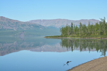 Fototapeta na wymiar Mountain lake Yt-Kyyol on the Putorana plateau.