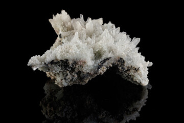 macro mineral stone Quartz Pyrite on a black background