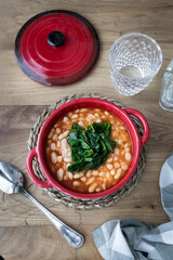 White beans stew with vegetables. Vegetal protein. Vegetarian diet. Food photography