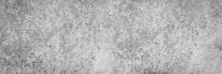 Obraz premium Panoramic grey paint limestone texture background in white light seam home wall paper. Back flat wide concrete stone table floor concept surreal granite quarry stucco surface grunge panorama landscape