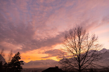 Vaduz, Liechtenstein, December 14, 2021 Colorful sky over the alps in the evening