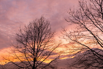 Vaduz, Liechtenstein, December 14, 2021 Colorful sky over the alps in the evening