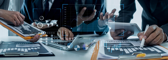 Business people hands working on network and digital finance marketing chart with future technology innovation and digital transformation concept.