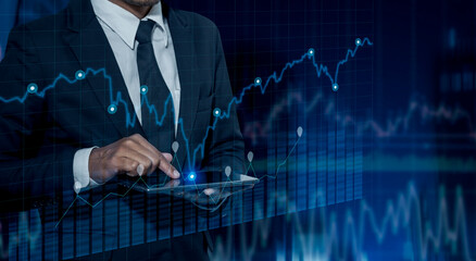 Business people hands working on network and digital finance marketing chart with future technology innovation and digital transformation concept.