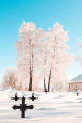 Christian church with cemetery in the snow in the arctic circle in Norway