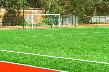 soccer gates. Football goal at the stadium. Football field with artificial lawn. Concept other party of soccer.  At stadium.