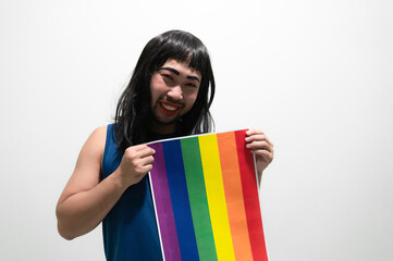 LGBT Pride month concept,Asian Handsome male make up and wear woman cloth,Gay Freedom Day,Portrait of Non-binary on white background