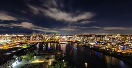 Aerial View of Downtown Vancouver City during night time. False Creek Area, British Columbia, Canada. Modern Cityscape