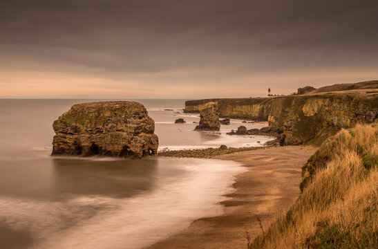 The view along Marsden Bay near Sunderland, of the cliffs and the Sandstone Sea stacks, as the tide comes in