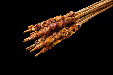 Delicious kebabs，skewers shashlik kebab with red sauce,