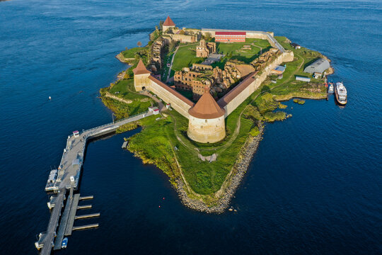 Aerial photography of the Oreshek Fortress in Shlisselburg in summer in Lake Ladoga. Top view of Walnut Island with a fortress. Russia, Shlisselburg, 08.21.2021