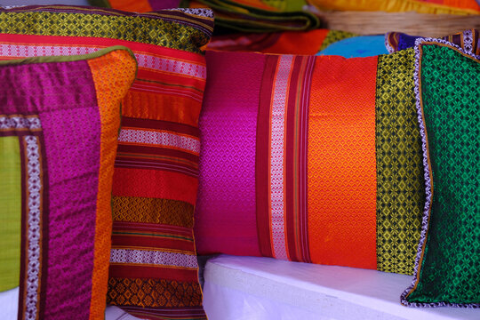 Pune, India - 25 December 2021, Colorful pillows in the Rural fare. Beautiful Tradition Clothing.