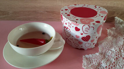 valentine's day symbol. box in the shape of a heart with the words 