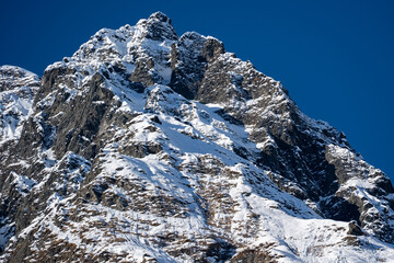 view of the snow capped alps in the hohe tauern national park in salzburg , austria at a sunny clear winter day