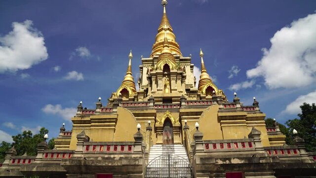 Landscape sculpture of Wat Phutthathiwat or Phutthathiwat Temple at Betong Yala southern thailand - Beautiful Golden pagoda  footage ado 4k