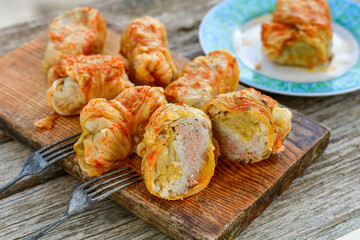 Cabbage rolls with meat, rice and vegetables. Stuffed cabbage leaves with  ground beef. Known as sarma, golubtsy, dolma.