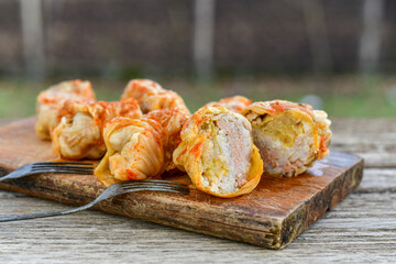 Cabbage rolls with meat, rice and vegetables. Stuffed cabbage leaves with  ground beef. Known as sarma, golubtsy, dolma.