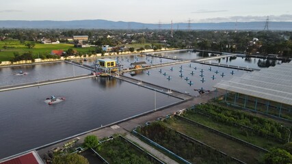 Aerial view wastewater treatment plant. Filtration of dirty water or waste water located in Bantul,...