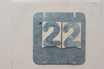 galvanized steel plate with the number 22 on paper