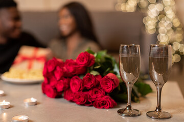 Black Couple Celebrating Valentine Holiday Indoor, Selective Focus On Flowers