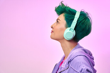 Woman in retro wear listening to music
