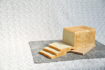 Plain toasted bread whole. White bread toast slice.	
