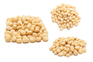 Macadamia nuts isolated on white background.