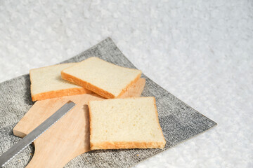 Plain toasted bread whole. White bread toast slice.	
