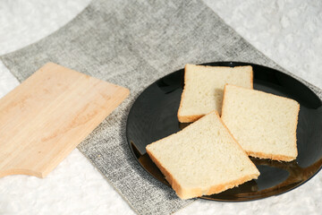 Plain toasted bread whole. White bread toast slice.	
