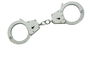Metal handcuffs on a white isolated background