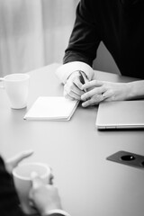 Man with a pen and paper in an office 