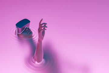 surreal girl with VR glasses immersed in liquid