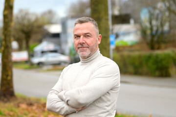 Portrait of an serious confident middle-aged man