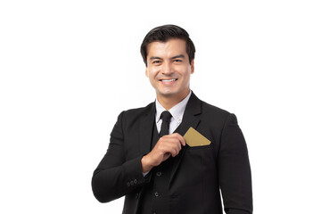 Handsome business man in black suit put or take out credit card in pocket isolated on white background. Business, technology, ecommerce and online payment concept.