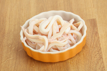 Marinated squid strips in the bowl
