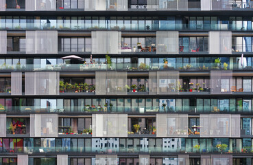 Detail of modern building with various apartments