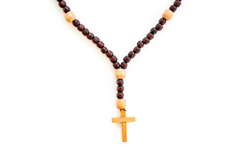 Faith and prayer concept - rosary beads with cross