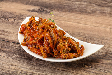 Canned anchovy in tomato sauce