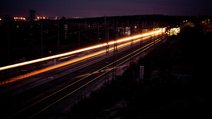 Fototapeta na wymiar Lightpainting on the train tracks.