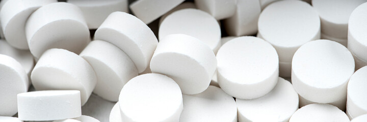 Mint candy close up. White mint candies in an open tin box. Fresh breath or bad breath concept
