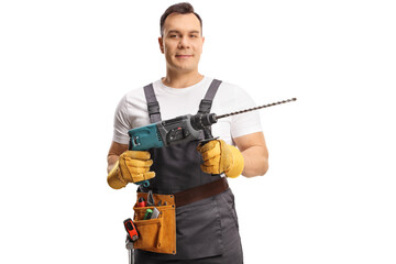 Portrait of a repairman holding a drilling machine