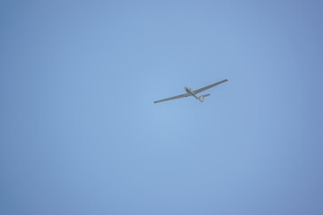 1984 Grob G-109B C-N 6314 a low wing two-seat self-launching motor glider flying in a blue sky