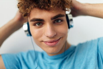 Fototapeta premium kinky guy in headphones music emotions Lifestyle unaltered